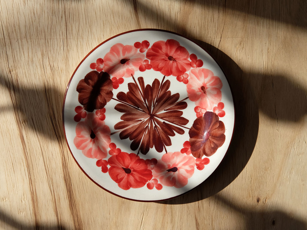 ceramic plate with pink flowers