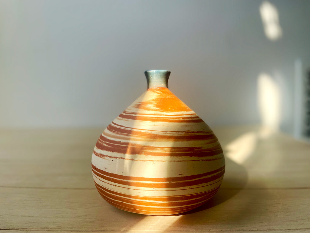 red pottery vase